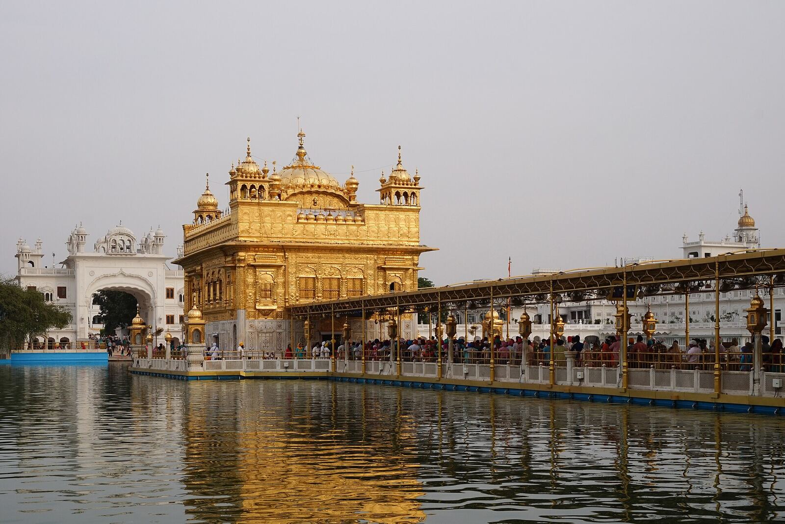 Golden Temple | Sikh Saints The Golden Temple, a Sikh shrine in Amritsar, India, shimmers with gold and reflects on the water.
