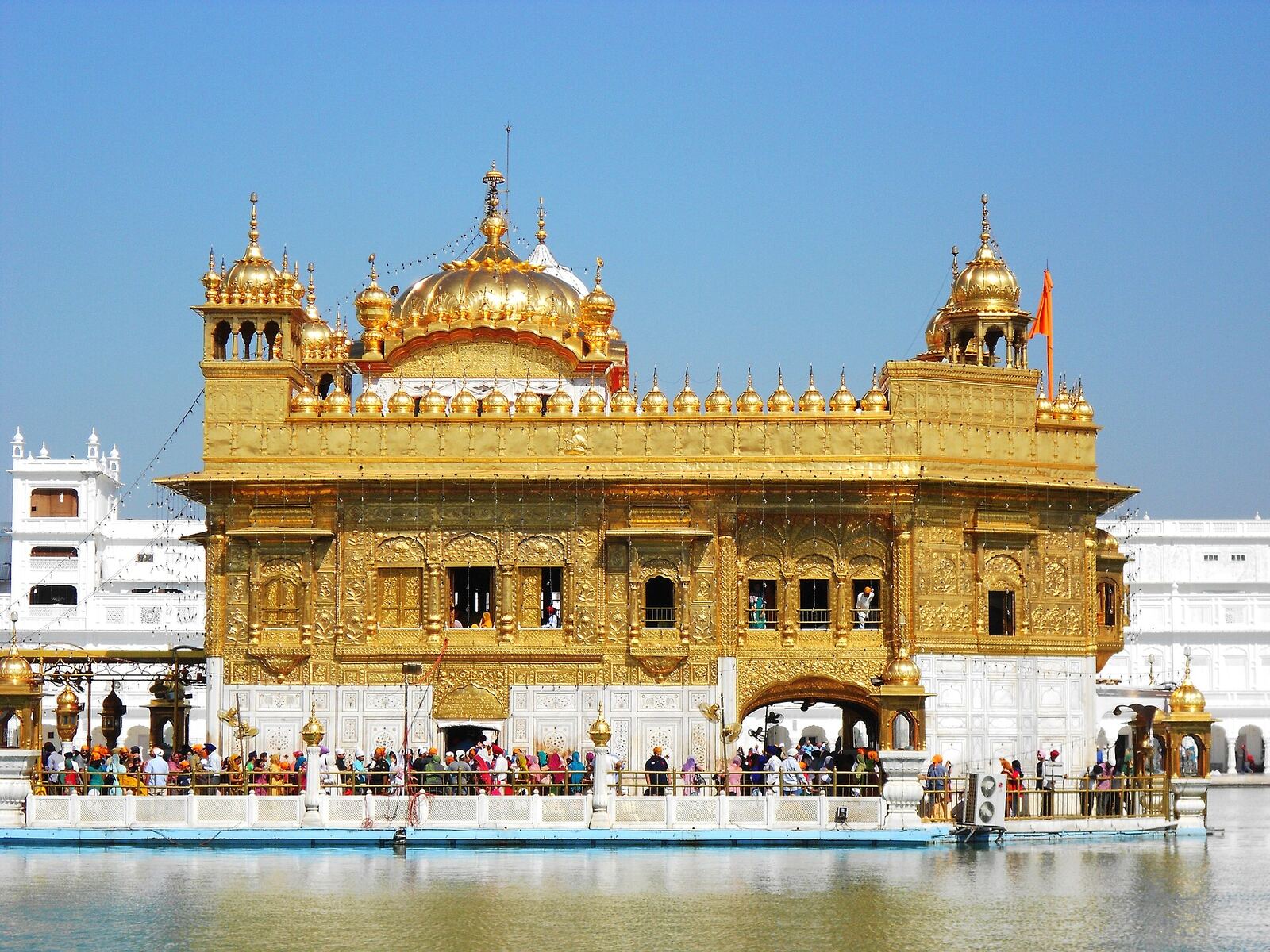 Golden Temple | Sikh Saints The Golden Temple, Harmandir Sahib, shines in Amritsar, a central place of worship for Sikhism.