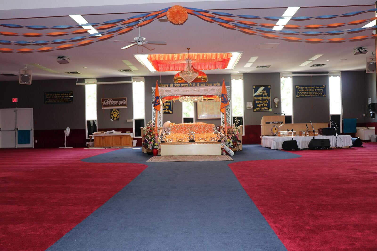 Gurdwara Main Hall | Sikh Saints A Gurdwara's main hall features the Guru Granth Sahib, central to Sikh faith.