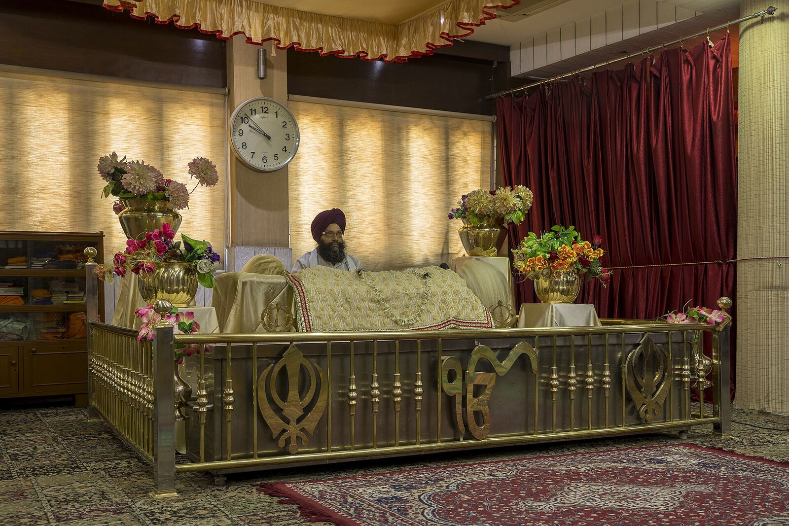 The Guru Granth Sahib, the holy book of the Sikhs, inside the Gurudwara Bara Sikh Sangat in Kolkata